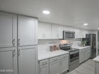 More Details about MLS # 6350446 : 7618 N 19TH DRIVE